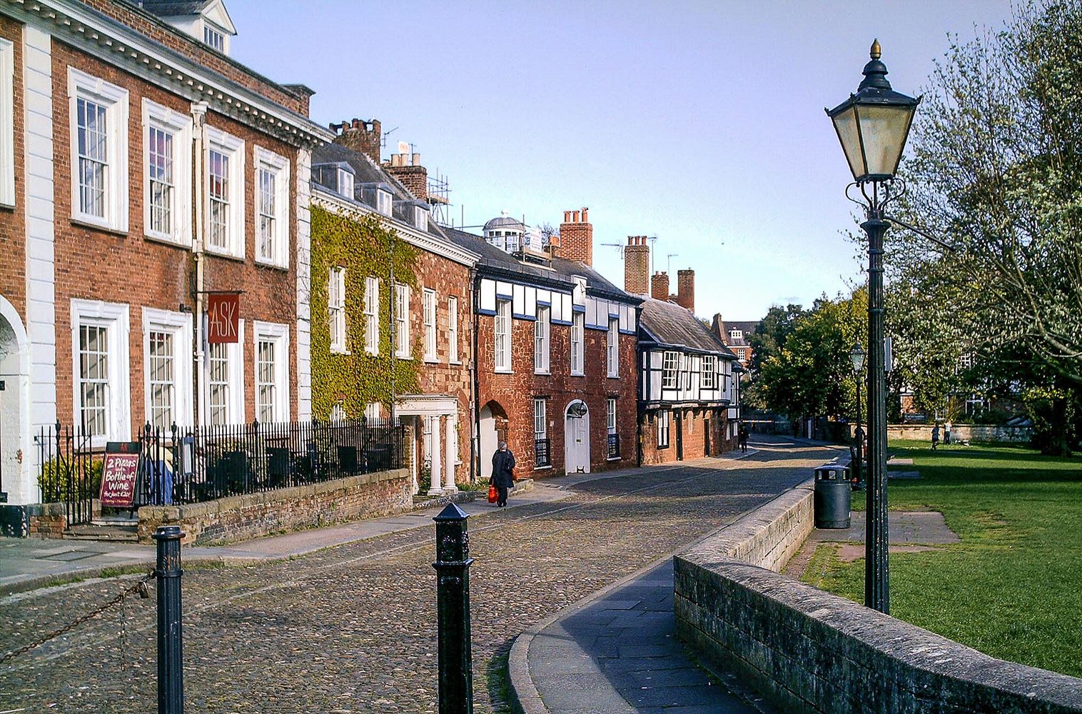 Attractive crescent of historic buildings in Cathedral Close, Exeter in Devon, UK.