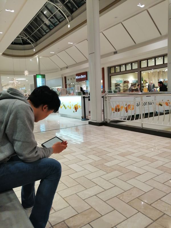 A man waiting in mall