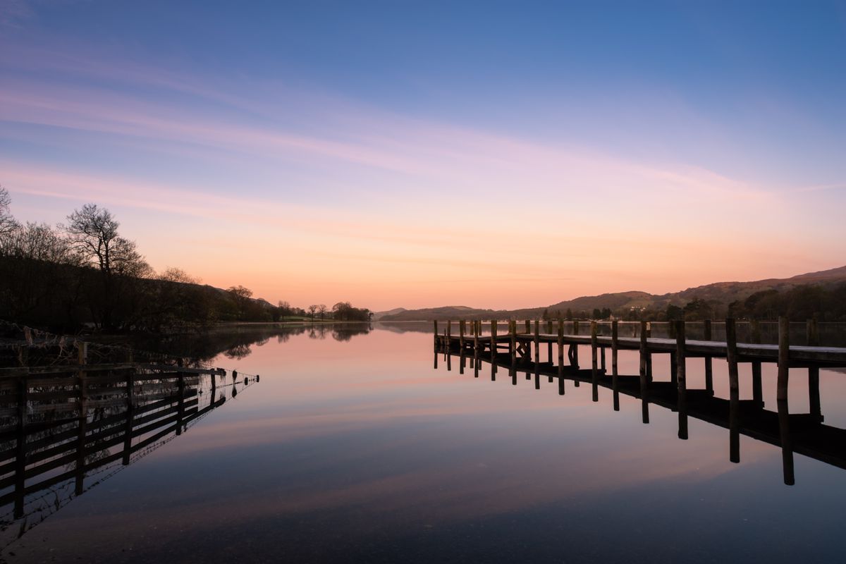 Lake district Cumbria including Coniston water, copper mines mountain cottages Coniston and Kelly hall tarn sunset 