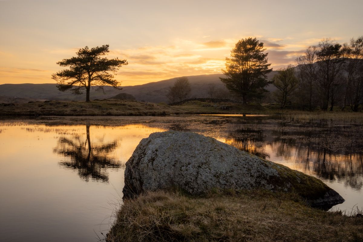 Kelly hall tarn  sunset near the Coniston mountain range in the lake district. Cumbria 