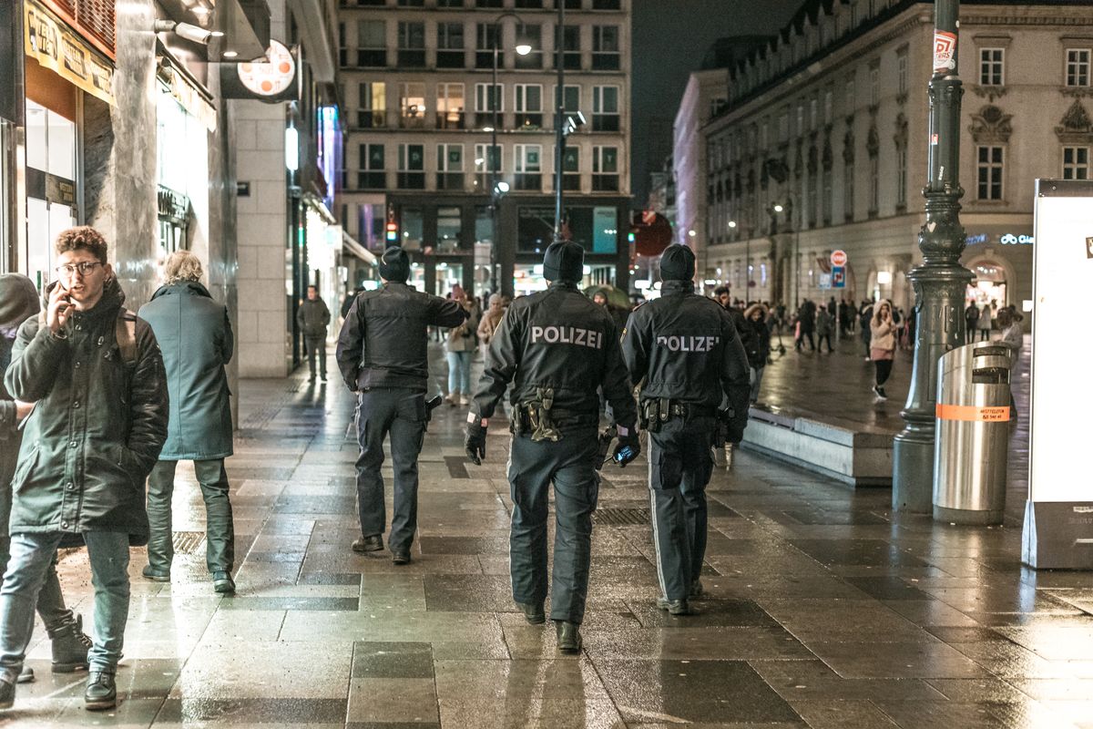 Police walking in pedestrian zone in Vienna