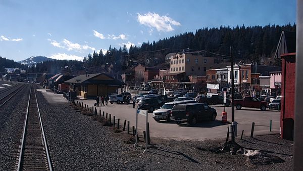 Small town, Truckee, CA USA as Amtraks California Zephyr pulls away from station