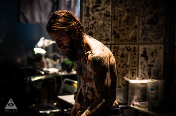 Street portrait of a tattooed man