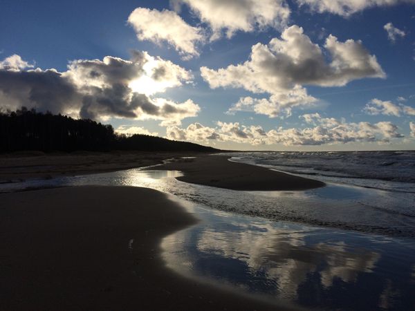 Saulkrasti beach Latvia sea sun clouds