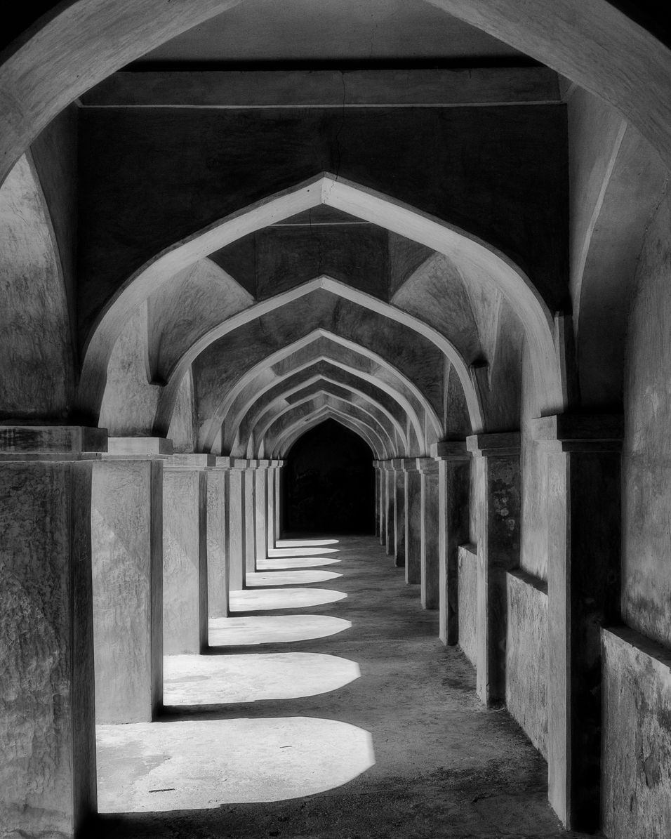 Archway in the shadows monochrome